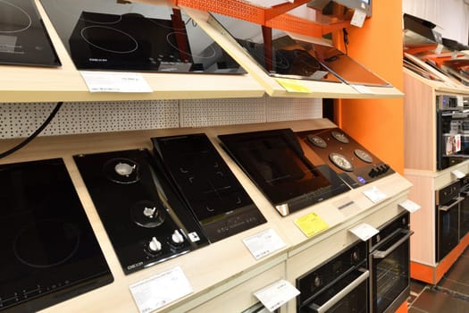 Moscow, Russia - Oct 19. 2023. Electric cooktop in DNS network store selling household appliances in Zelenograd