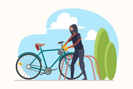 Bicycle theft by thief on city street, male robber in disguise mask, hoodie picking lock