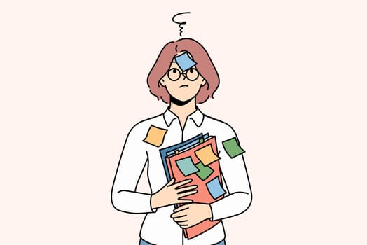 Confused woman student with stickers on face and shirt needs ability to do task management