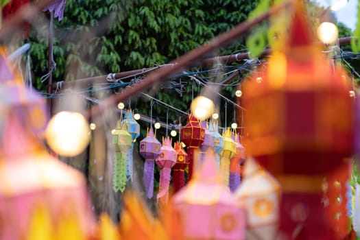 Colorful Lanna paper lanterns hang in Lamphun temples. Popular lantern festival during Loy Krathong in northern Thailand. Traditional Yi Peng paper lantern. The Hundred Thousand Lantern Festival.