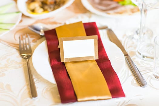 Blank event Guest Card on restaurant table close-up