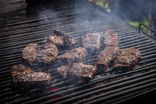 Grilled beef steak on the grill