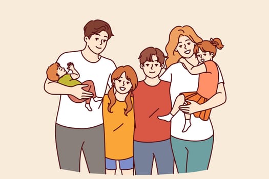 Family from teenagers and toddlers with mom and dad posing together for family portrait. Concept of guardianship of children left without parents or assistance to boys and girls from orphanages