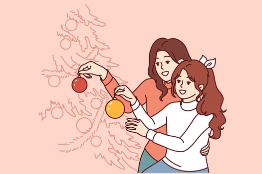 Mom and daughter decorate christmas tree, decorating branches with gift balls and garlands