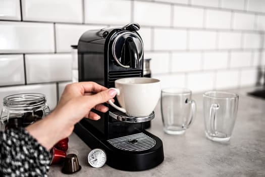 Capsule coffee machine at domestic kitchen