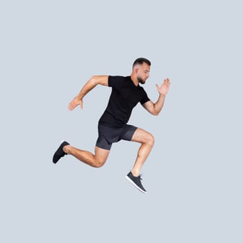 Confident serious energy millennial caucasian man in black sportswear run, jump