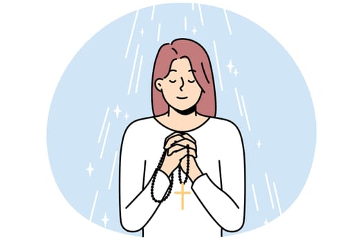 Woman with rosary praying