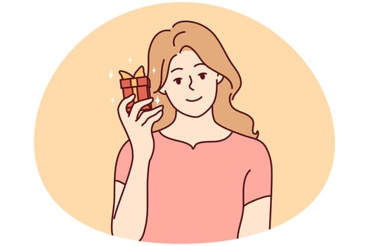 Smiling woman with present celebrate birthday