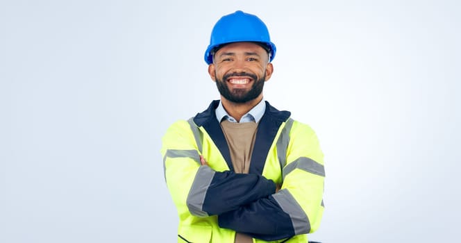 Happy man, portrait and professional architect in confidence with arms crossed on a studio white background. Male person, contractor or engineer smile with hard hat for construction on mockup space