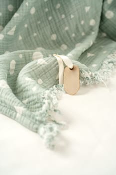 Muslin baby cotton blanket on white background