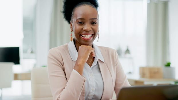 Portrait, black woman and hands on chin for business, motivation and positive mindset in digital marketing. Face, person or happy for startup, corporate career and entrepreneur in work office with pc