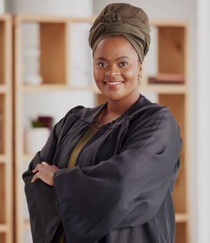 Black woman, portrait and lawyer with confidence at office with leadership in career. Face, smile and confidence with attorney at legal agency is proud with empowerment or a positive mindset.