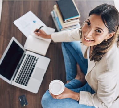 Top view, woman or laptop portrait for finance student, office investment management or financial growth strategy. Happy smile, worker or technology budget planning, insurance or stock market study