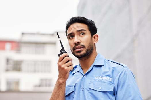 Walkie talkie, man and asian security guard for safety, city watch or call backup for help. Police officer, bodyguard and cop contact on radio communication, crime investigation or urban surveillance