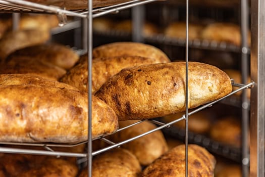 Close up of bread on shelves.