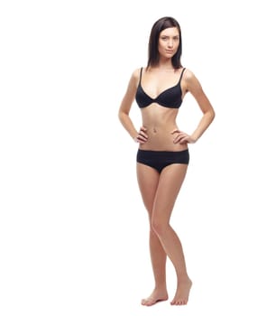 Young woman, portrait and full body in underwear to lose weight, slim or diet against a white studio background. Attractive female person or model posing in lingerie for health and wellness on mockup