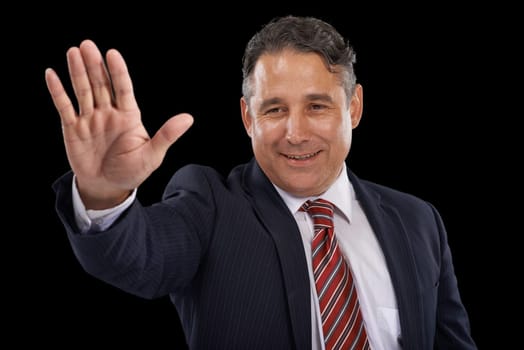 Government, happy politician and man in studio for wave, greeting and support on black background. Success, political campaign and person with hand gesture for leadership, pride and winning election