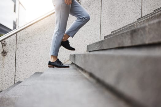 Walking, shoes and business woman on steps for morning commute, journey and travel. Professional goals, city and closeup of female person for career, work and job progress in urban town by building