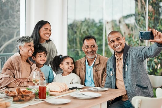 Family, food and smile for selfie at lunch, dinner or celebrate party together at home. Happy generations of kids, parents and grandparents in profile picture, quality time or reunion at dining table