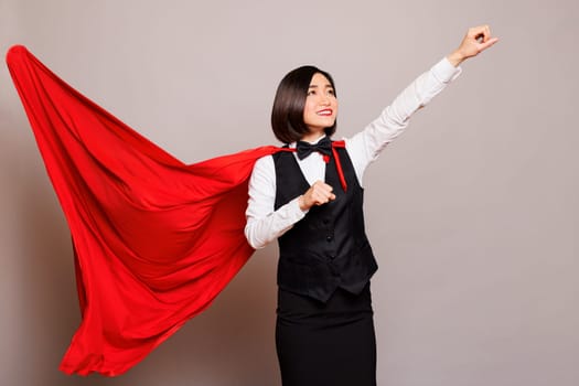 Waitress superwoman in cloak flying