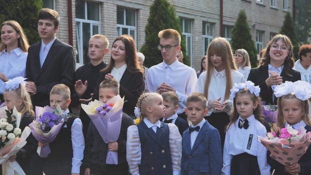Berezovka, Belarus - September 1, 2022: A celebration of the first of September in a Belarusian school.