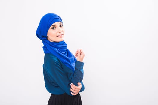 Portrait of young muslim woman wearing traditional arabic clothing