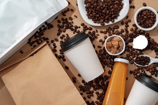 Blank brown kraft paper pouch bag with coffee beans and paper cup for your design