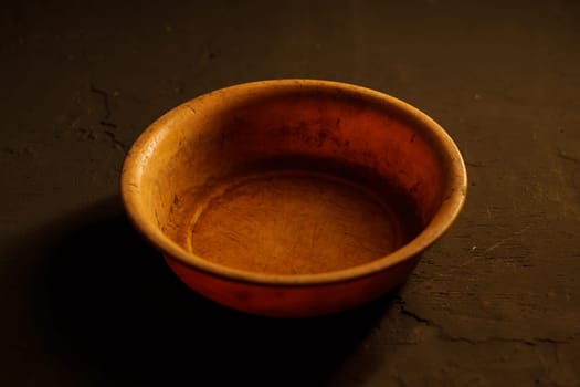 Empty bowl on dark background with copy space
