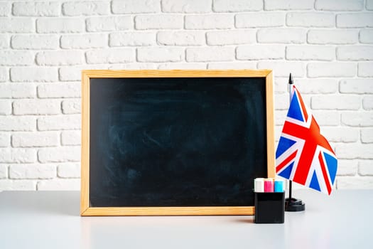 Flag of the United Kingdom and blackboard with space for text