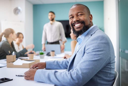 Office, business meeting and portrait of black man for conversation, collaboration and discussion. Corporate, company and face of happy person with staff for teamwork, planning and project feedback