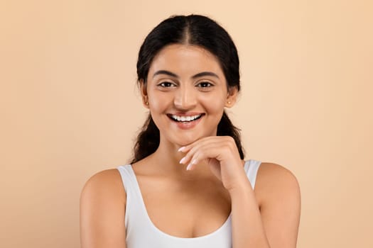 Young Indian woman with silky smooth skin demonstrating her natural beauty