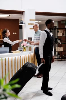 Friendly hotel staff welcomes guests