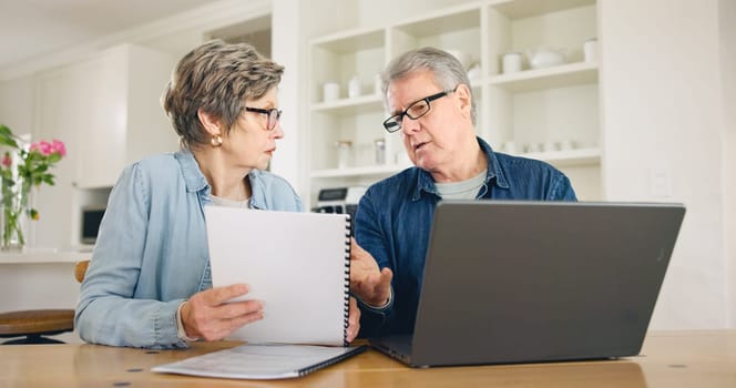 Senior couple, bills and stress on laptop for home debt, financial fail or budget risk with questions or planning on laptop. Elderly woman and man with documents for loan and inflation or bankruptcy