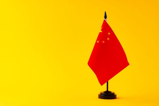 Flag of China on color background close up