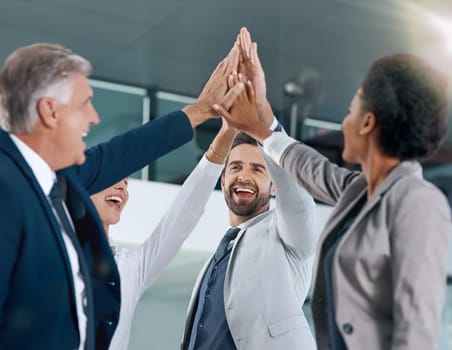 Group, success or happy business people high five in celebration of goals, target or teamwork. Partnership mission, smile or excited workers in office for motivation, solidarity or winning a deal