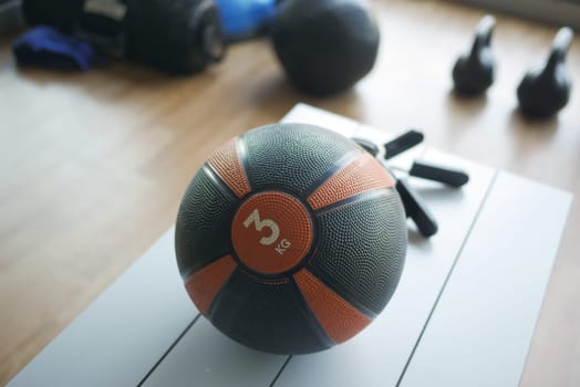 Gym Equipment or Dumbbell Kettlebell in a gym bench