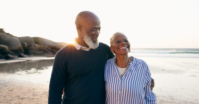 Senior couple, smile and hug on beach, love and bonding on vacation, holiday and trip to ocean. Happy black people, embrace and support or trust, commitment and connection in marriage or retirement