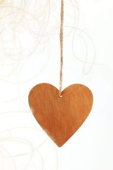 A wooden heart is a symbol of love. Valentine's day greeting Card.