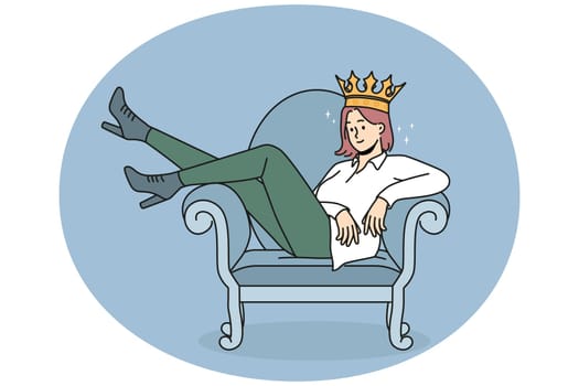 Confident woman in crown sitting on chair
