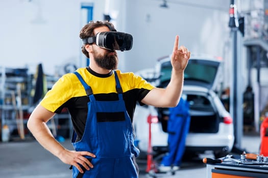 Technician fixes car components with VR