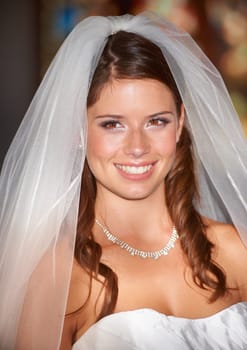 Happy woman, face and bride smile for wedding day, marriage or commitment at indoor church. Attractive female person, wife or fiance getting married with stylish veil in beauty at bridal ceremony