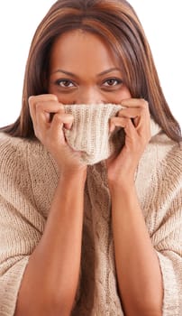 Shy, black woman and sweater with portrait, funny and girl isolated on a white studio background. Face, African person and model with winter clothing, cover and playful with emotion, goofy and silly
