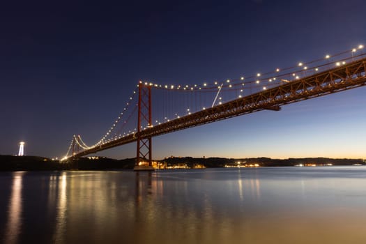 25 april bridge in Lisbon, Portugal at dusk