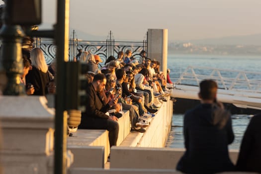 14 november 2023, Lisbon, Portugal - Group of People looking to sunset