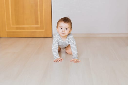 Portrait of a crawling baby boy