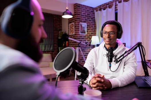 Podcast presenter conversation with man