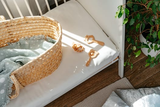 Nursery interior and bedding for kids with wicker bassinet