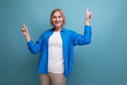 informal modern middle-aged woman in a beautiful shirt shows emotions inside
