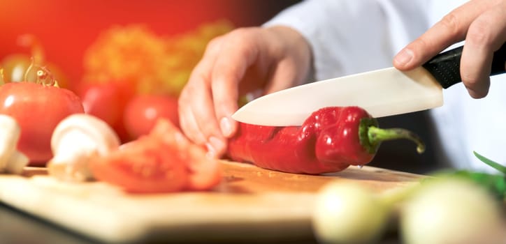 Chef prepares fresh vegetables. Cooking, healthy nutrition concept