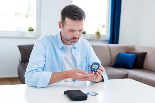Man measures his blood sugar, diabetes concept